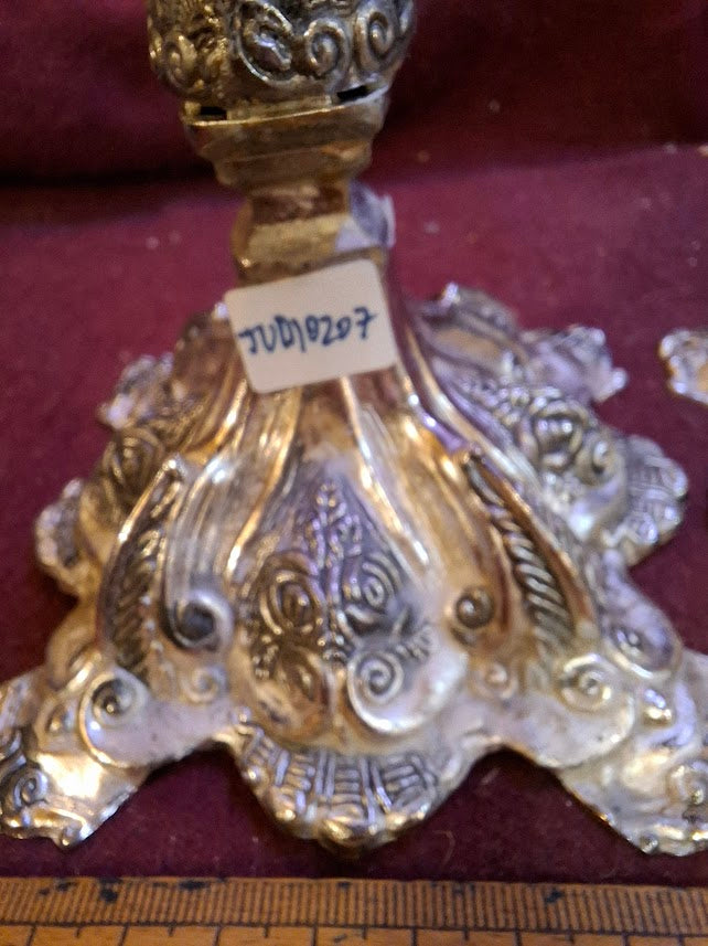 A pair of silver plated candlesticks [JUD10207]