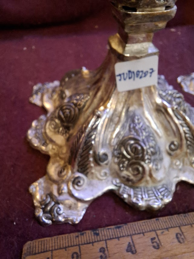 A pair of silver plated candlesticks [JUD10207]