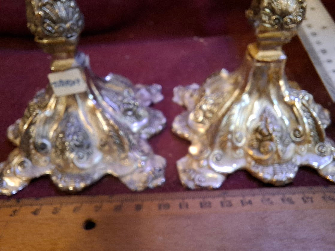 A pair of silver plated candlesticks [JUD10207]