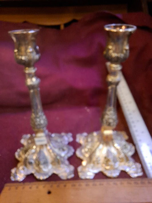 A pair of silver plated candlesticks [JUD10207]