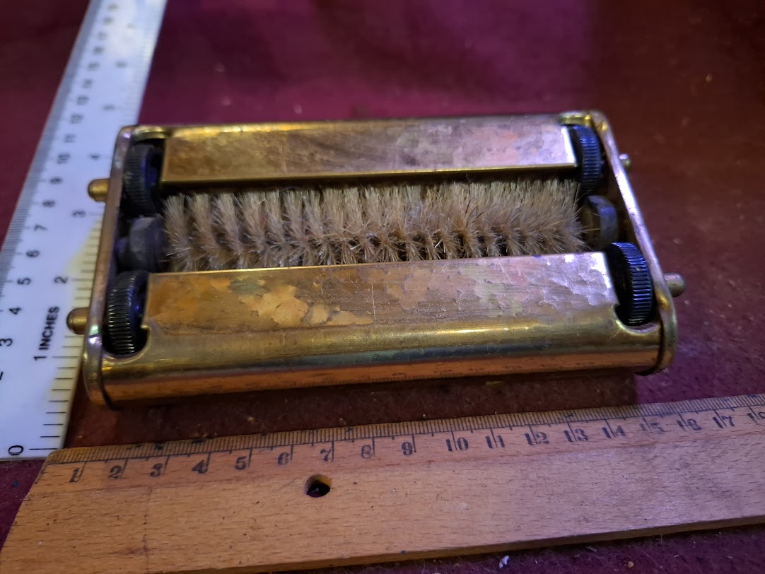 Vintage Clears crumbs from a table [TOL10327]