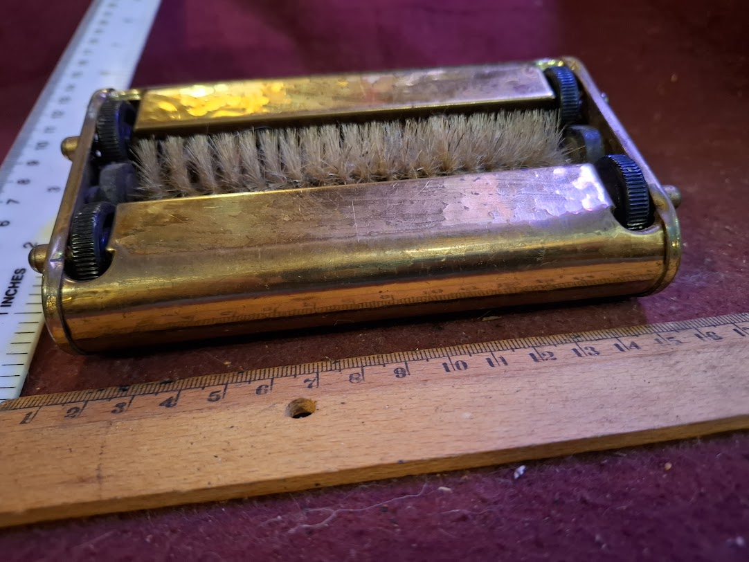 Vintage Clears crumbs from a table [TOL10327]