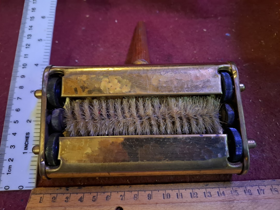 Vintage Clears crumbs from a table [TOL10327]