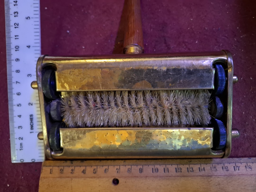 Vintage Clears crumbs from a table [TOL10327]
