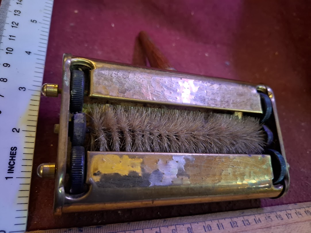 Vintage Clears crumbs from a table [TOL10327]